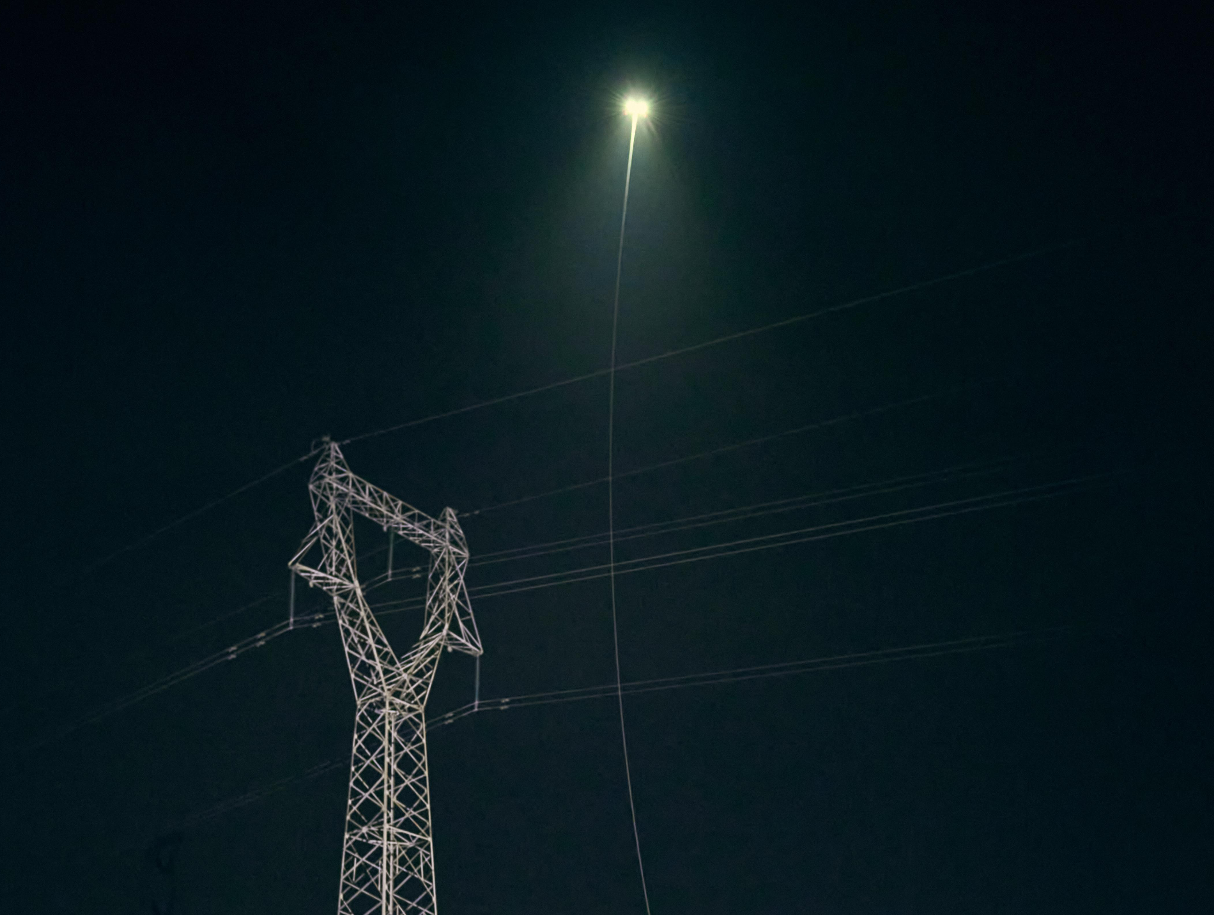 Drones with searchlights and tethers
